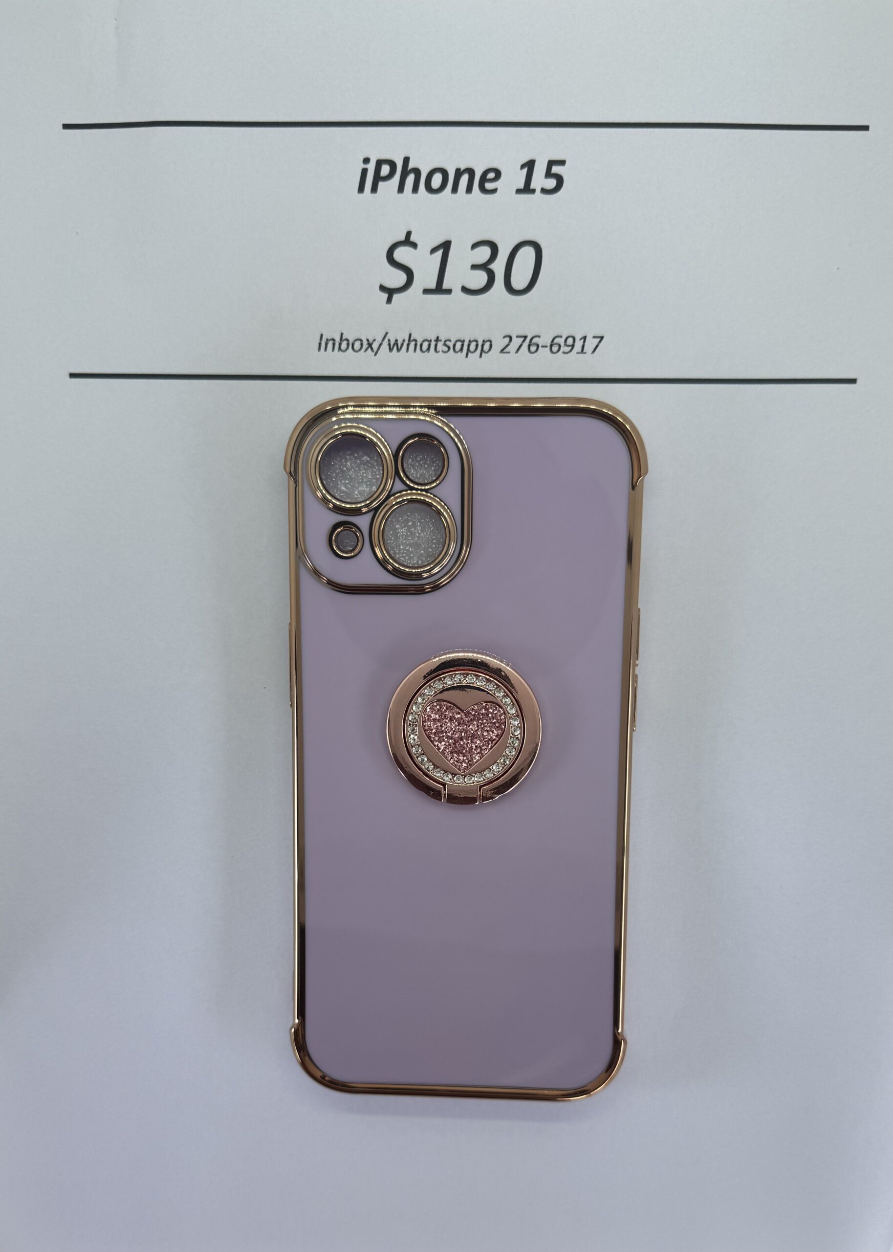 iPhone 15 Purple case with pink heart pop ring